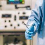 doctor holding scissors